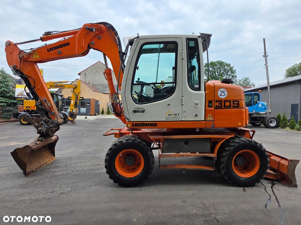 Liebherr A309 Litronic - 1