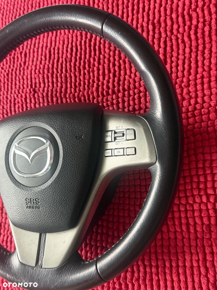 Mazda 3 5 6 koło dojazdowe 16cali T125/70 R16 Mazda 6 GH 2008/2010r kierownica air bag stan b.dobry kierownice Mazda 2 dy de 3 BK bl bp 5 CR CW 6 gg GY GJ cx-5 cx-3  plastiki wloty powietrza lampa tył lewa lub prawa strona Europejska stan b.dobry oryginalna w 100% sprawne oraz inne części - 3
