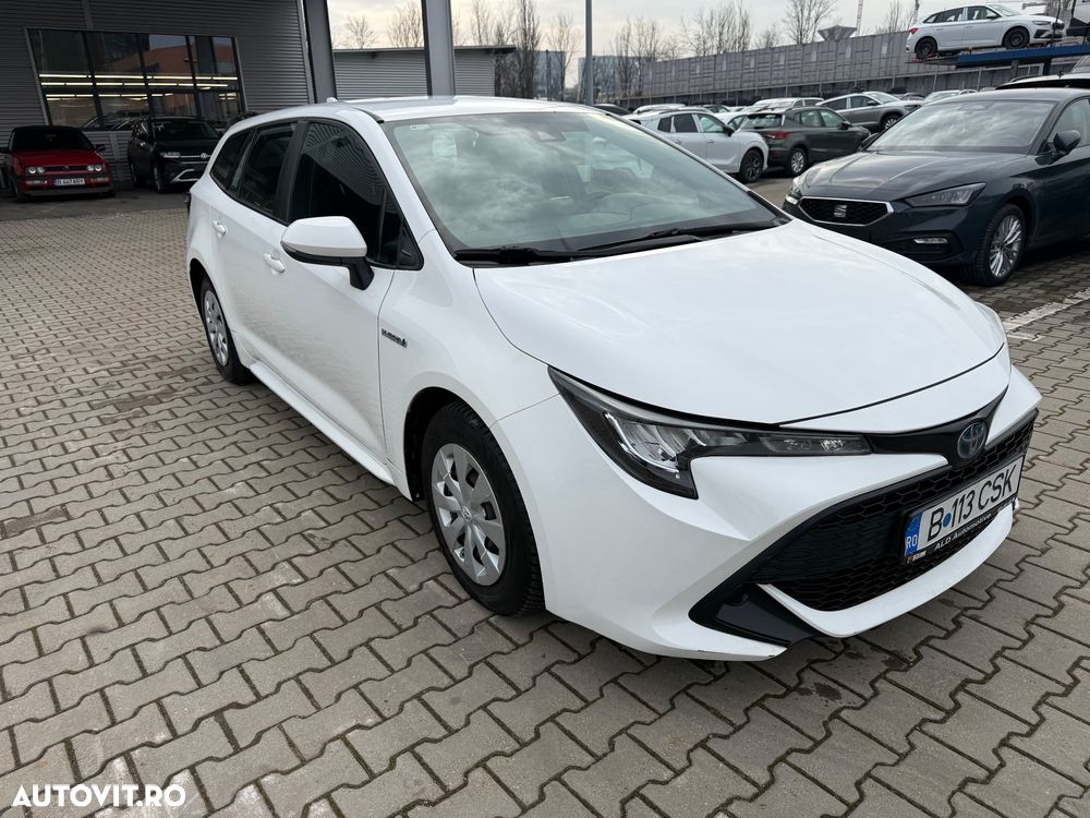 Toyota Corolla 1.8 HSD Business - 19