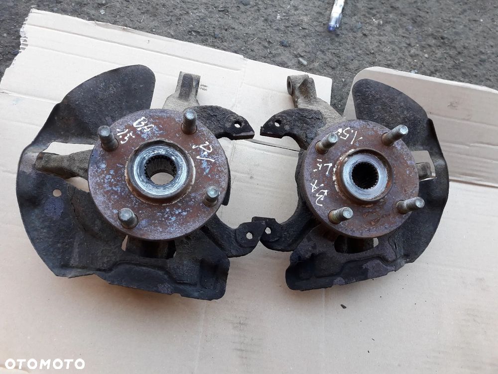 Mazda 323f 323 323p BA 94-98  Zwrotnica piasta Prawa lewa przednia prz - 1