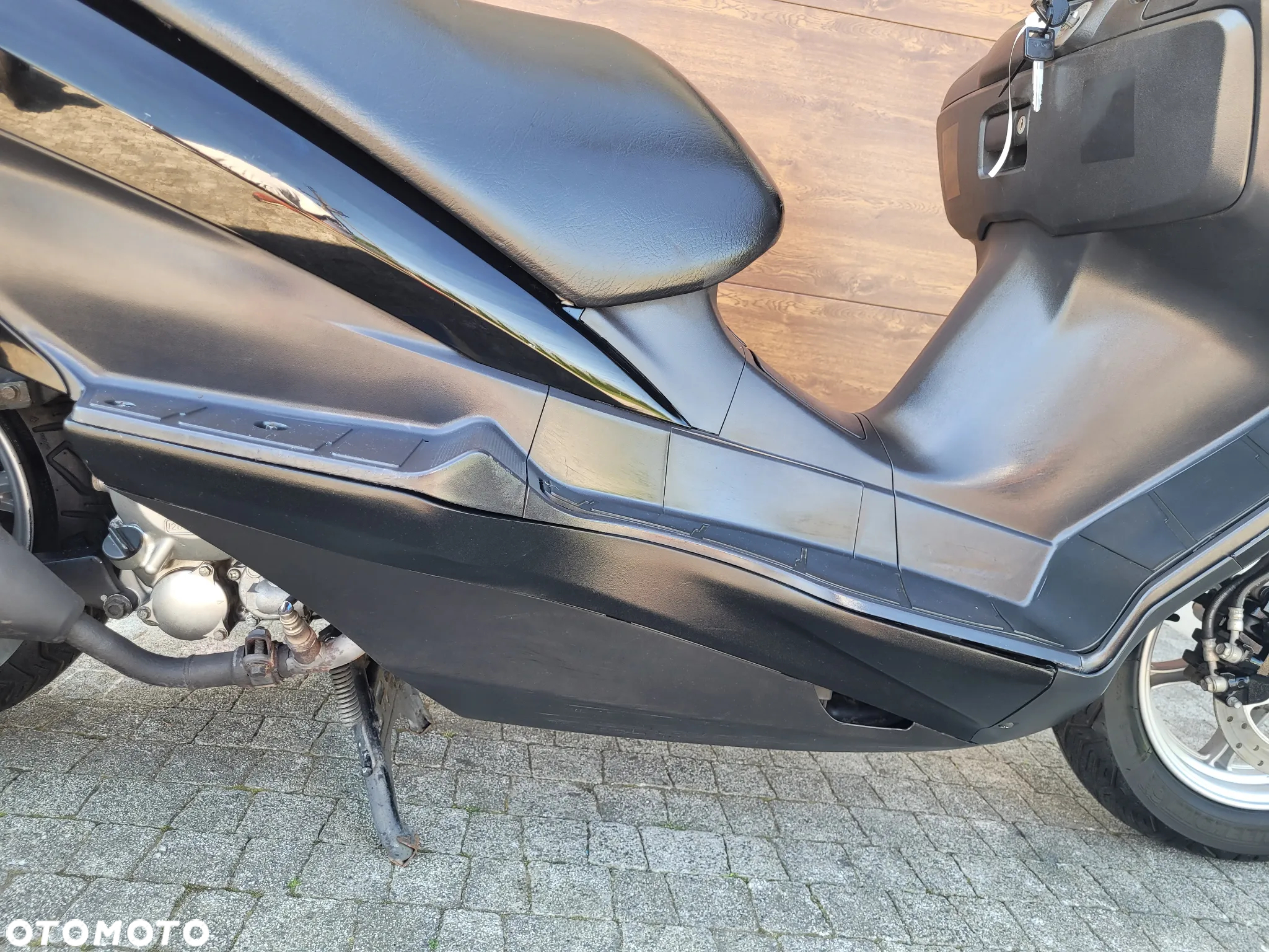Suzuki Burgman - 24