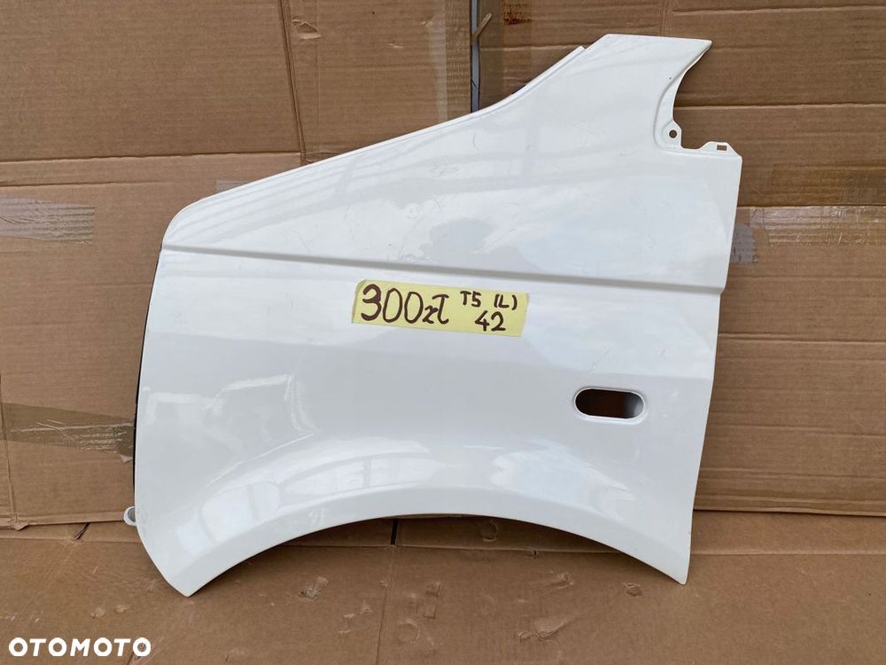 VW T5 TRANSPORTER MULTIVAN 03- błotnik lewy BIAŁY ORYGINALNY - 1