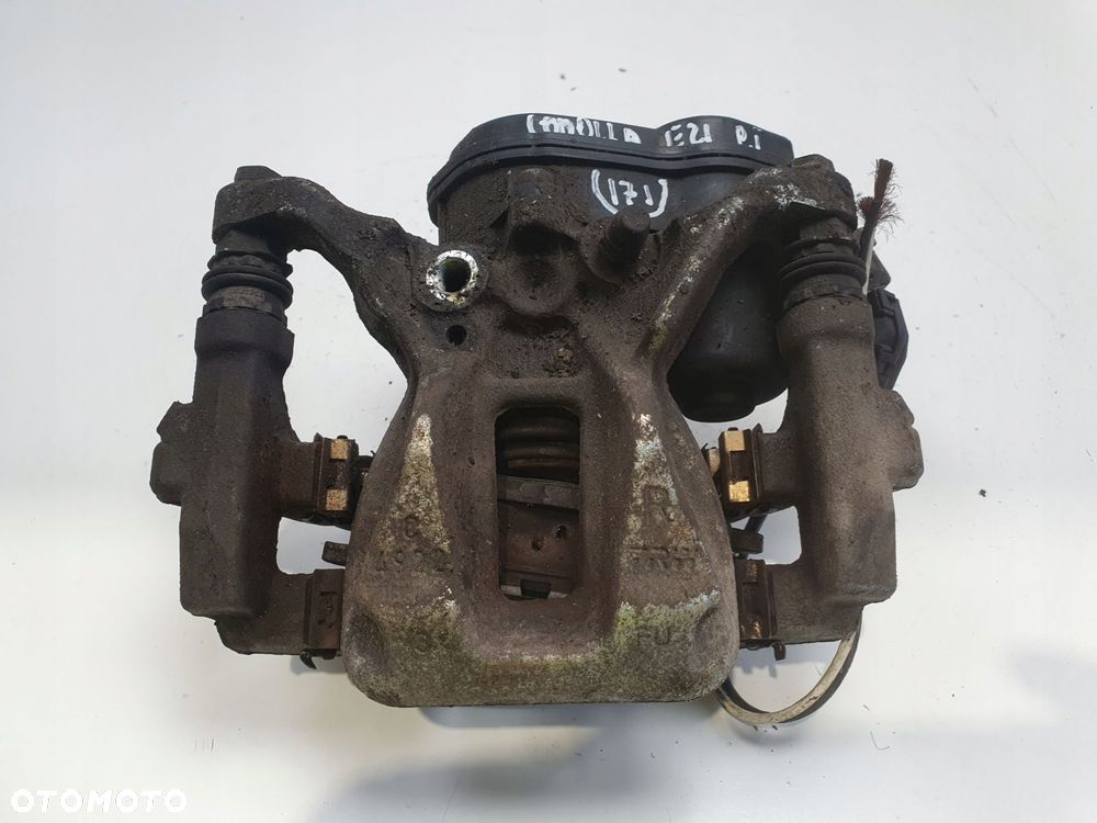 Toyota Corolla XII E21 TYLNY ZACISK HAMULCOWY prawy tył PASAŻERA A006B119B - 1