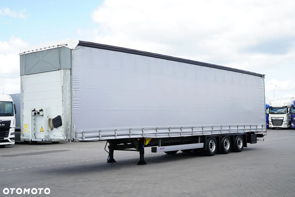 Schmitz Cargobull / FIRANKA / MEGA / MULTI LOCK / XL / OŚ PODNOSZONA - 1