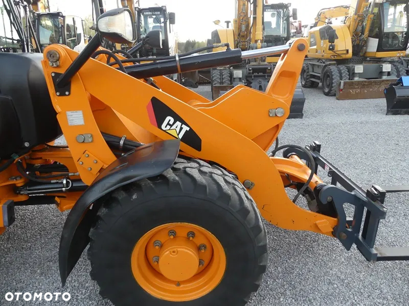 Caterpillar CAT 906H / Z Niemiec / 6424mtg / - 20