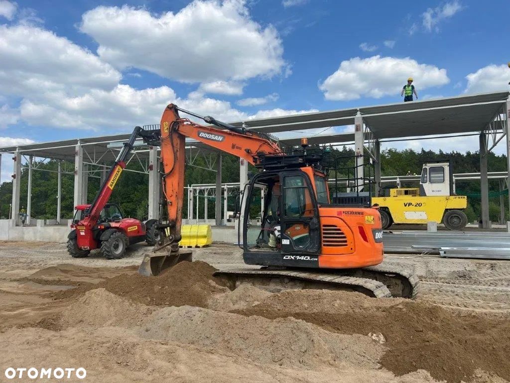 Doosan dx140 - 1