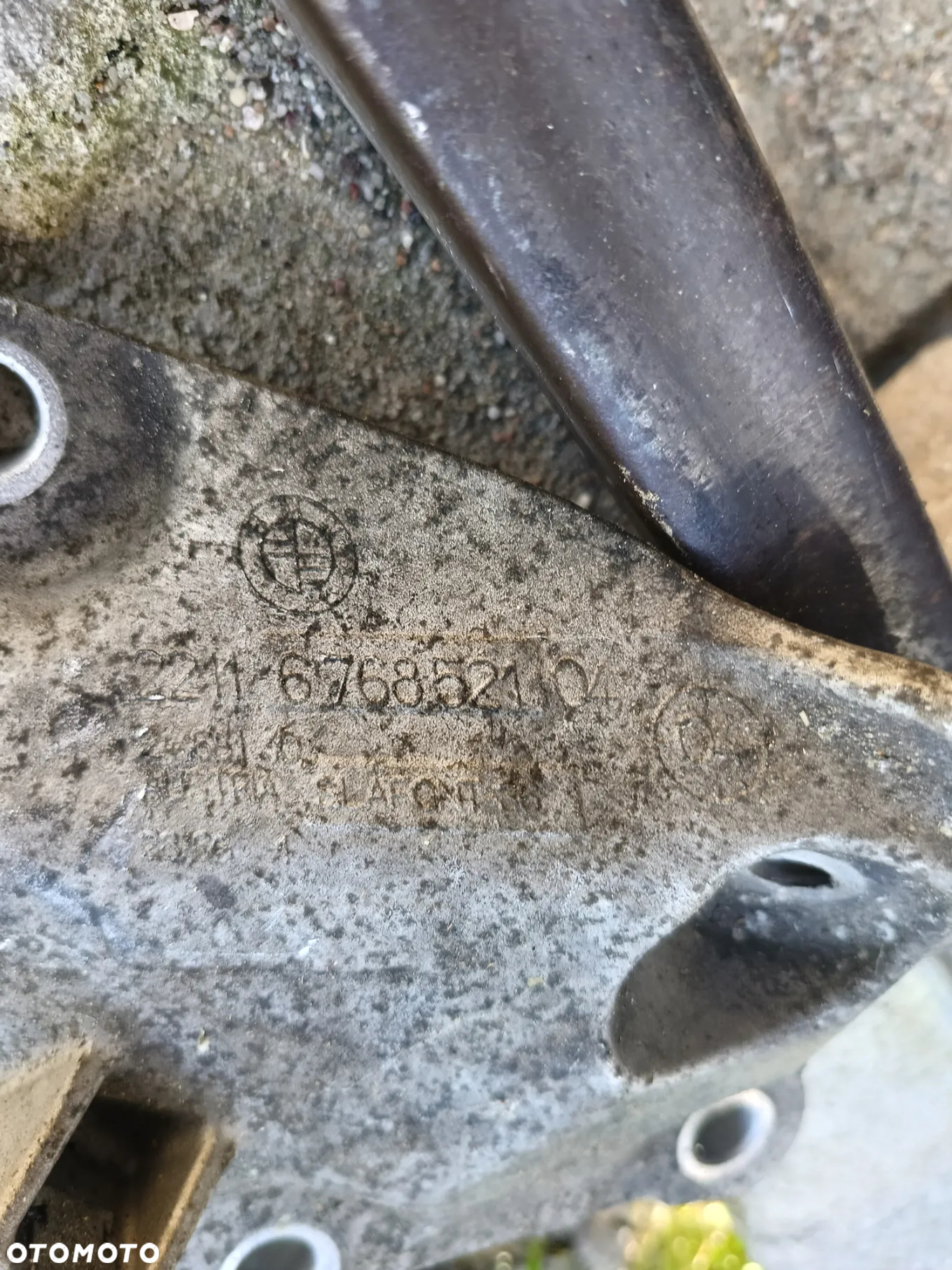 ŁAPA SILNIKA LEWA BMW E61 2.5 6768521 - 2