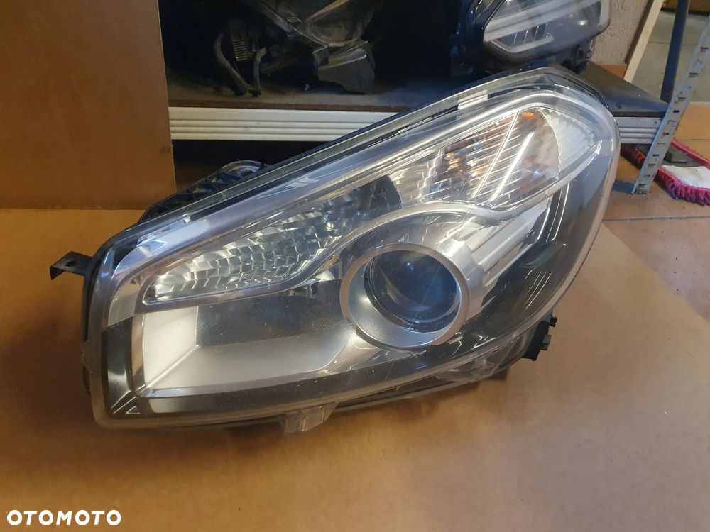 REFLEKTOR LEWY NISSAN QASHQAI J10 LIFT XENON