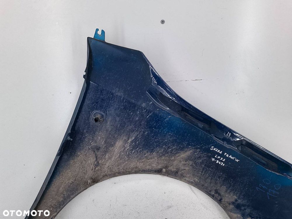 BŁOTNIK LEWY PRZÓD SKODA PRAKTIK LF5A - 9