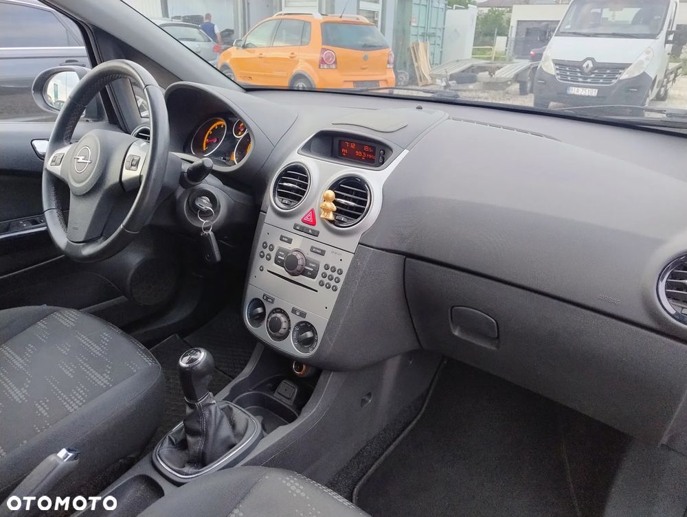Opel Corsa 1.4 16V Enjoy - 11