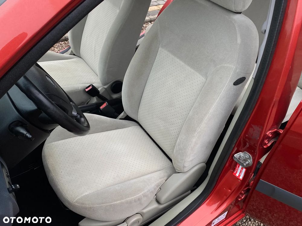 Ford Fiesta 1.4 Ghia - 31