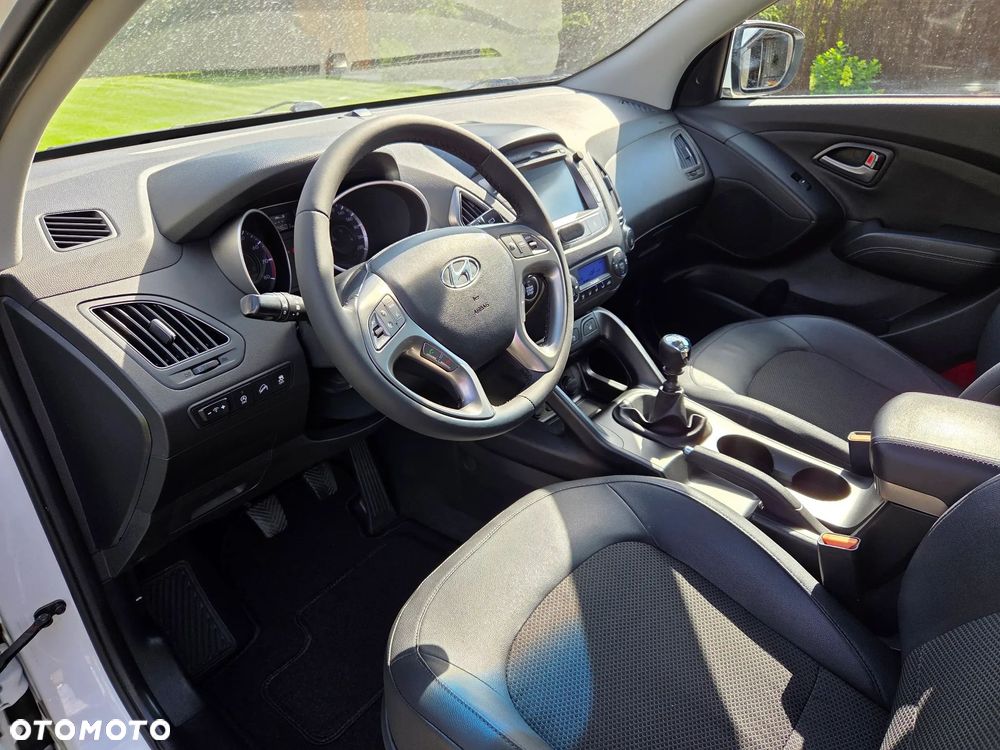 Hyundai ix35 blue 1.6 2WD Finale Gold - 16