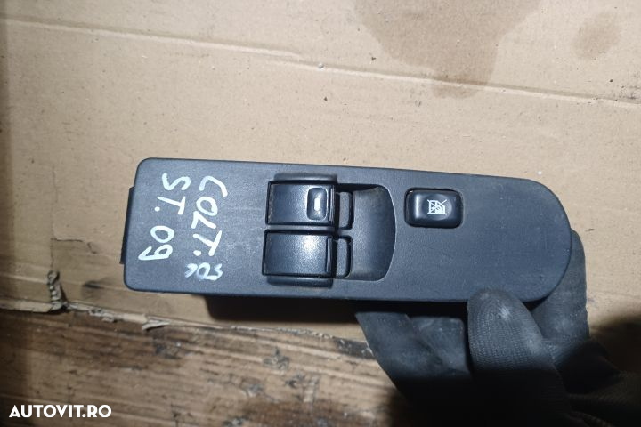 Butoane geam sofer 8608A179 Mitsubishi Colt Z30  [din 2002 pana  2009] Hatchback 5-usi 1.1 MT (75 h - 2