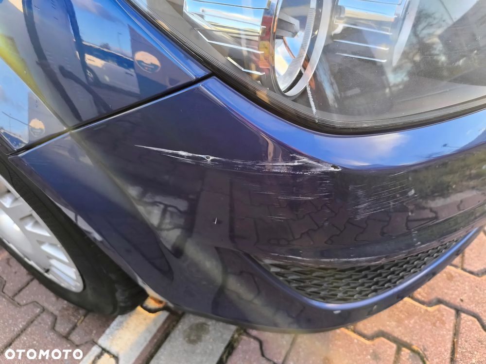 Opel Astra 1.4 - 8