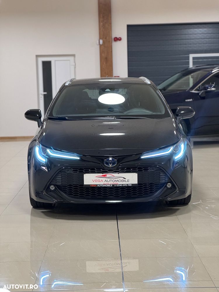 Toyota Corolla 1.8 HSD Exclusive - 34