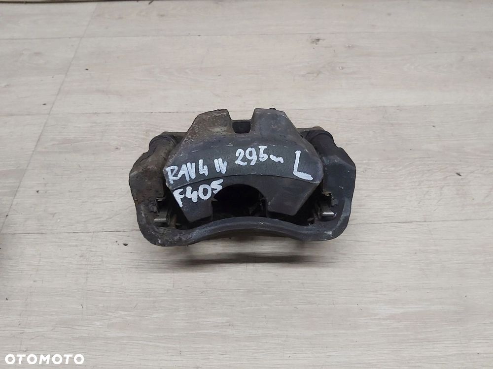 Toyota Rav4 IV XA40 13-18r zacisk jarzmo lewy przód 295mm - 1