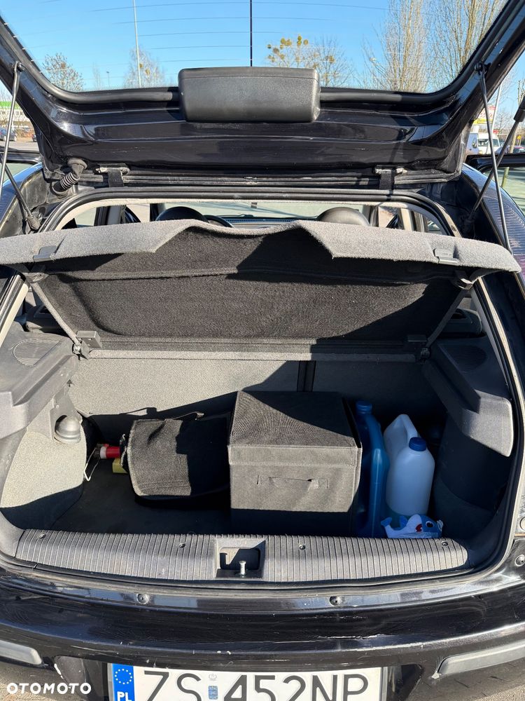 Opel Corsa 1.2 16V Enjoy - 11