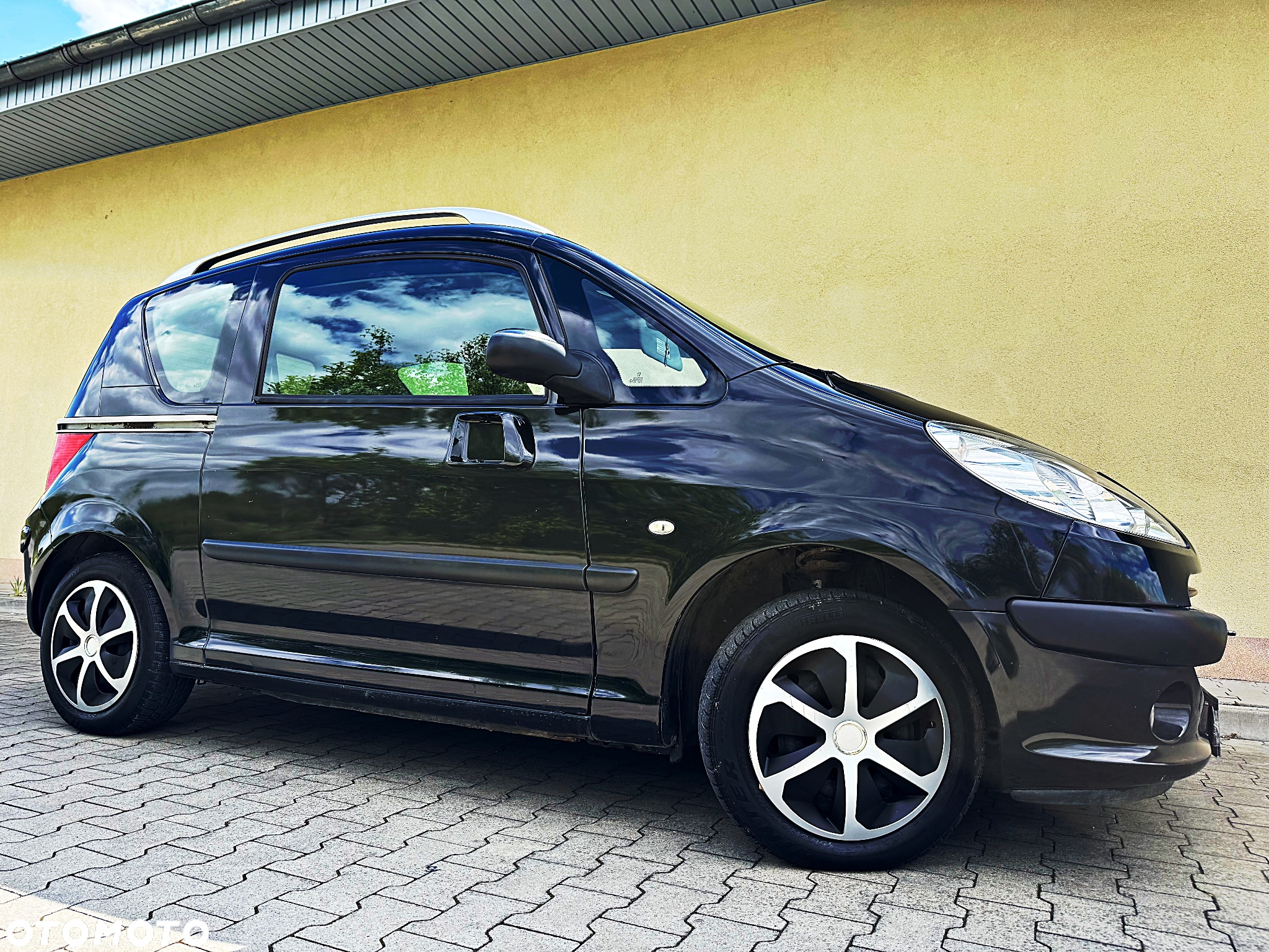 Peugeot 1007 1.4 Trendy - 13