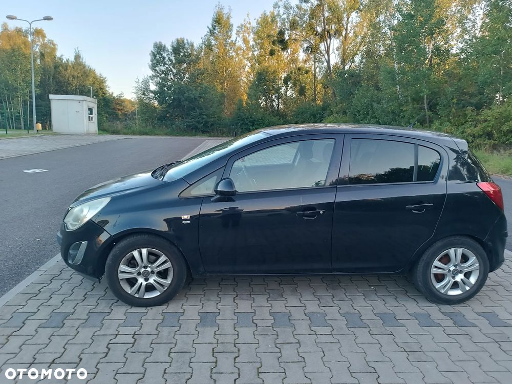 Opel Corsa 1.4 16V Cosmo - 11