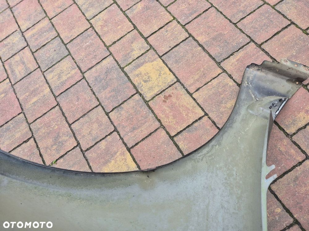 blotnik lewy przod saab 95 ng 10-12 - 4