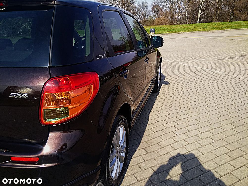 Suzuki SX4 1.6 Comfort Plus - 14