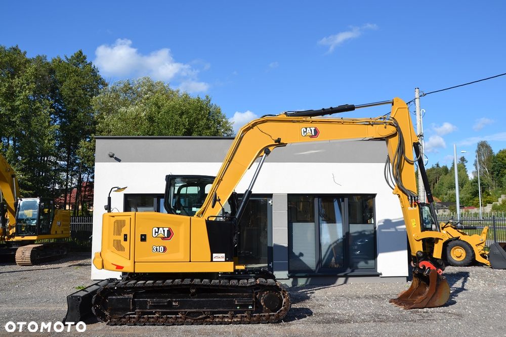 Caterpillar 310-07 A - 12