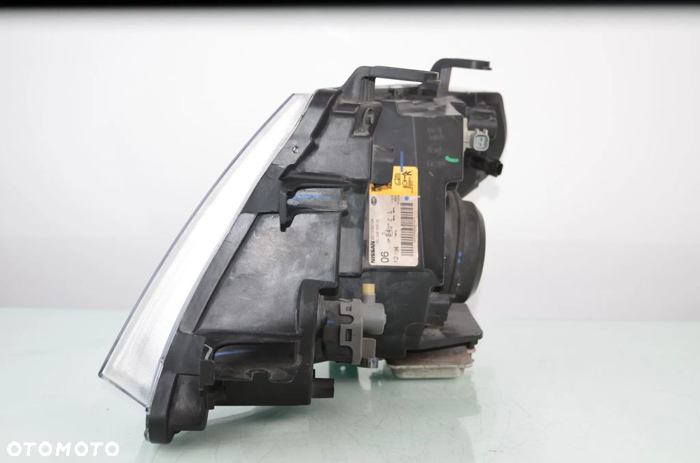 NISSAN NAVARA FACELIFT BI-XENON 09-12r 260105X10A PRAWA Przedni Oryginał - 3