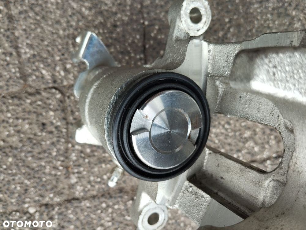 Zacisk hamulcowy Volvo V40 S40 prawy tył 38mm - 4