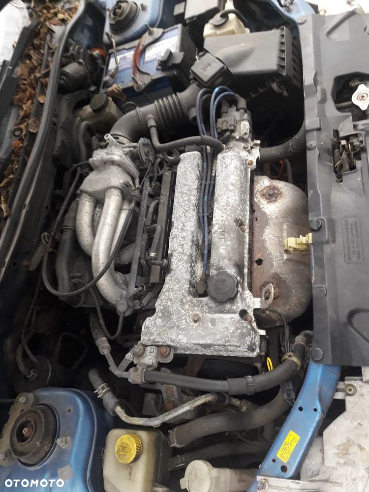 Mazda 323f 323 323p BA 94-98  Zwrotnica piasta Prawa lewa przednia prz - 7