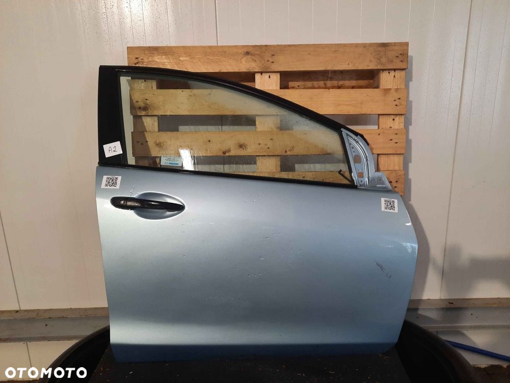 $ MAZDA 2  DRZWI PRZÓD PRZEDNIE PRAWE 07-14 R BŁĘKITNY