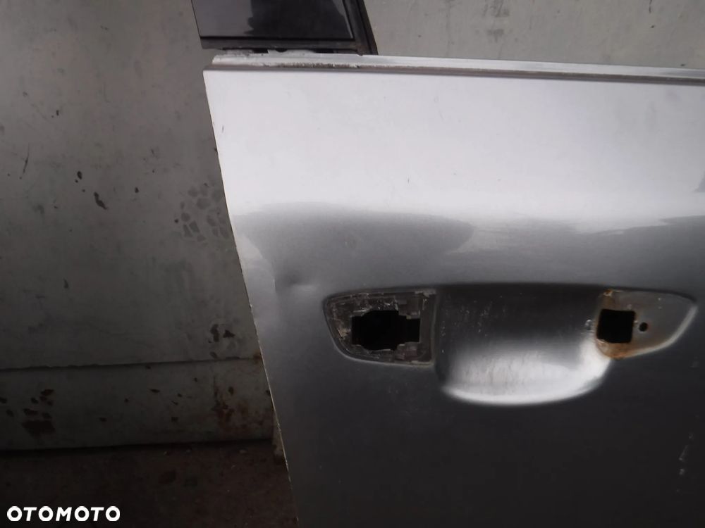 Skoda Superb II 2 kombi drzwi przod LF8L 2G2G szyba prawe - 2