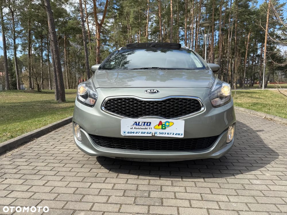 Kia Carens - 4