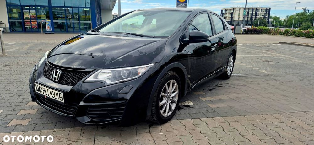 Honda Civic 1.4 i-VTEC Comfort - 1