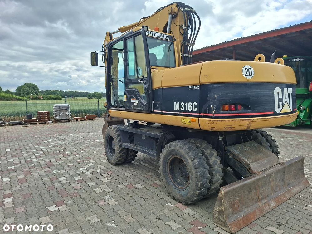 Caterpillar M316C - 3