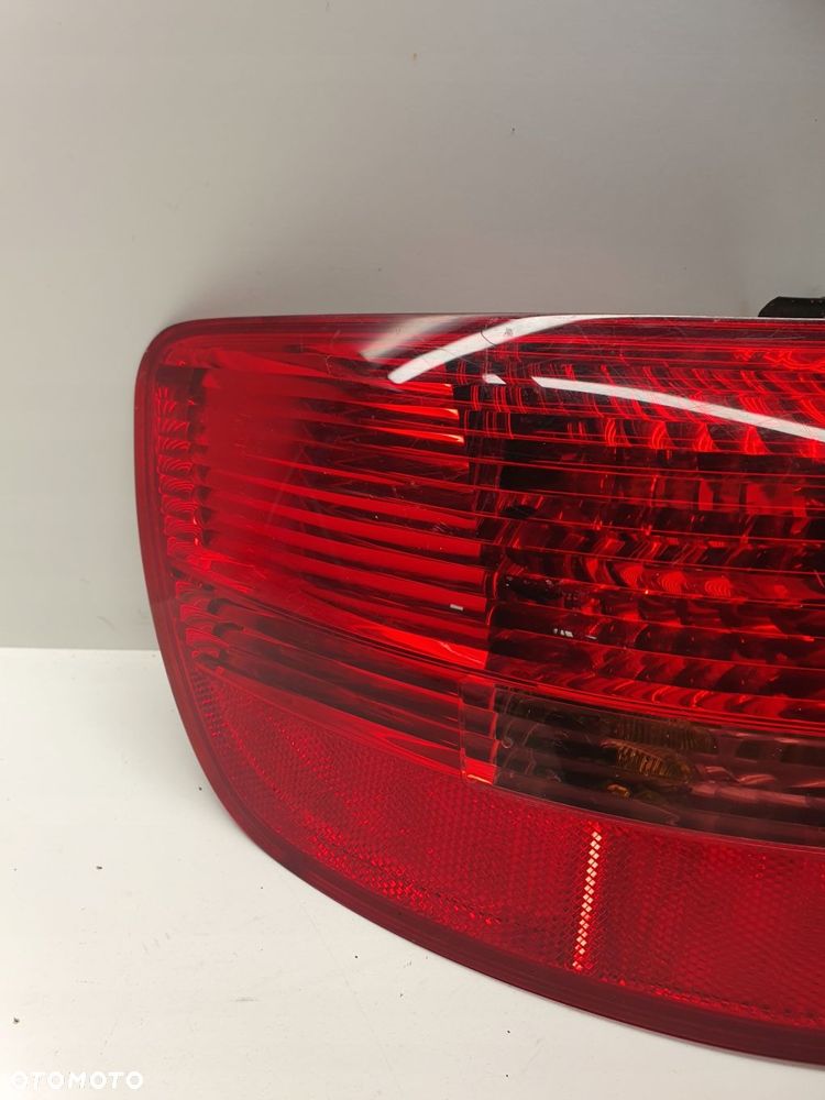 LAMPA LEWY TYŁ W BŁOTNIK AUDI A6 C6 4F9945095 - 3