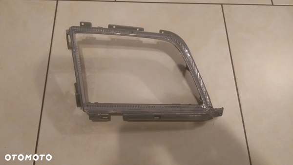 Ramka osłona lampy reflektora Mercedes SL 129 Oryginał 1298260359  1298260459