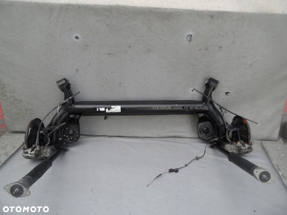 OŚ TYLNA BELKA ZAWIESZENIA TYŁ FORD FIESTA MK8 TARCZE IGŁA - 1