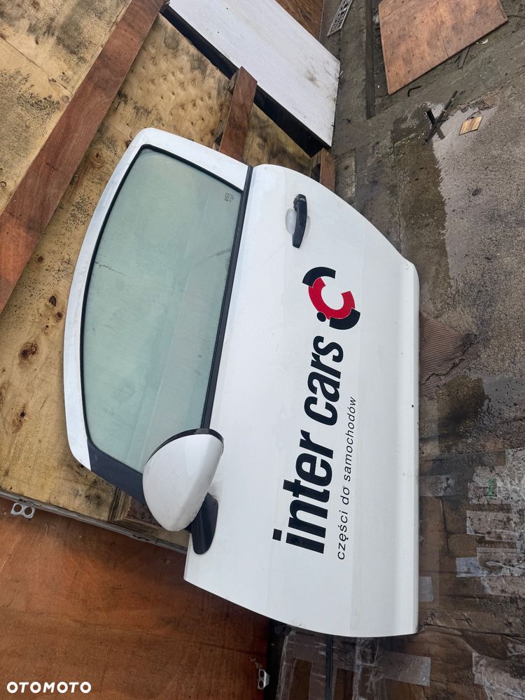 Opel Corsa D biała maska drzwi prawe lewe przednie przód pas przedni chłodnice wody klimy lampy lampa przednia prawa lewa błotnik prawy lewy biały białe zderzak przód przedni klapa bagażnika klapa tył tylnia lampa prawa lewa belka pod zderzak - 13