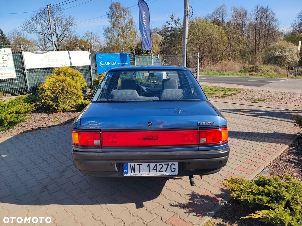 Mazda 323 - 12