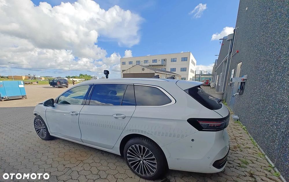 Volkswagen Passat 2.0 TDI SCR DSG 4Motion Elegance - 1