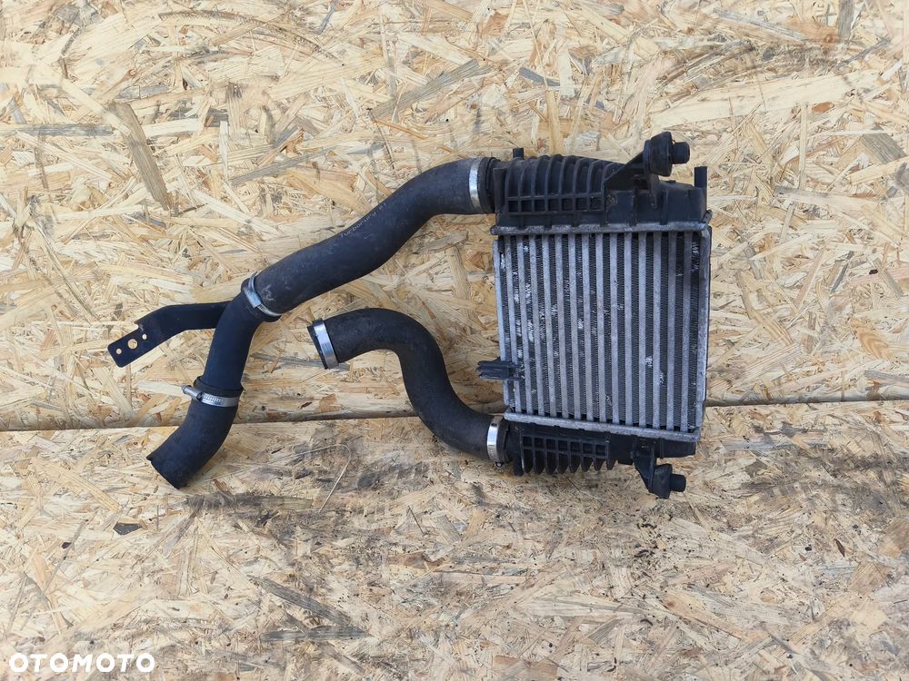 CHŁODNICA POWIETRZA INTERCOOLER 144611KB1A NISSAN JUKE F15 - 2
