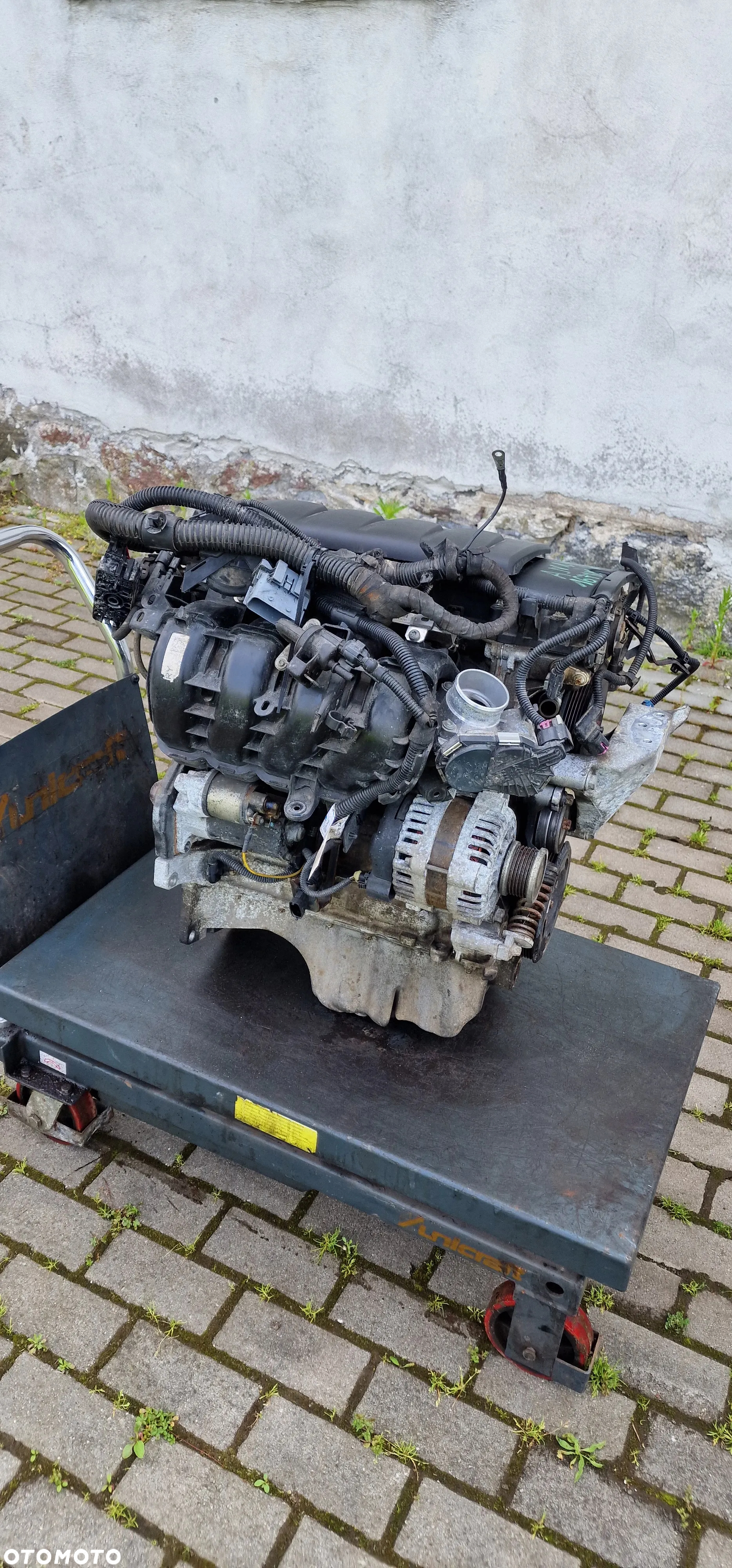 SILNIK  A14XER OPEL ASTRA IV J - 2