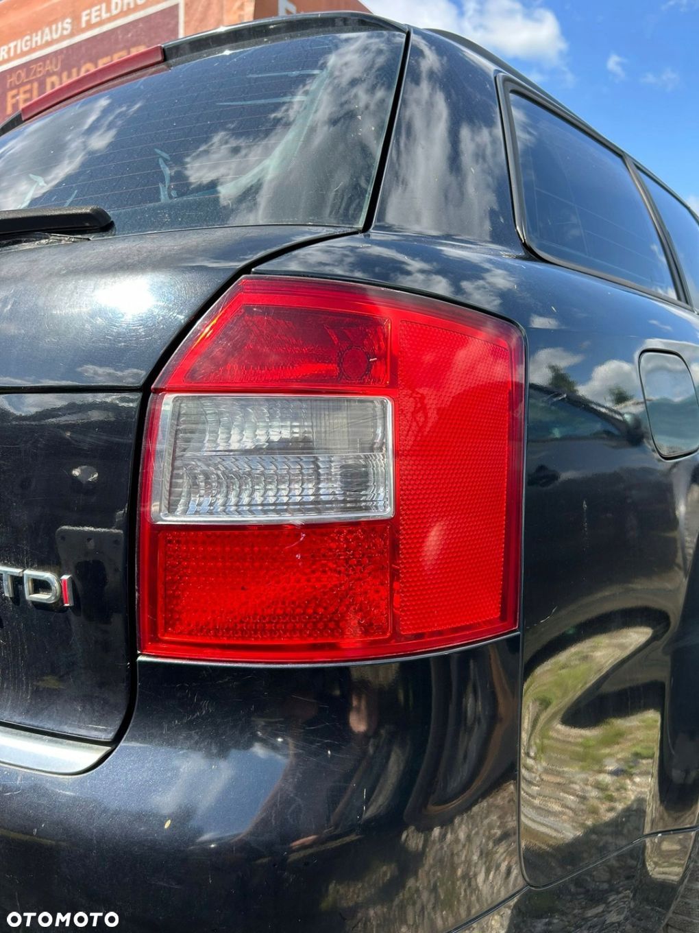 LAMPA REFLEKTOR TYLNY TYŁ PRAWY AUDI A4 B6 KOMBI - 1