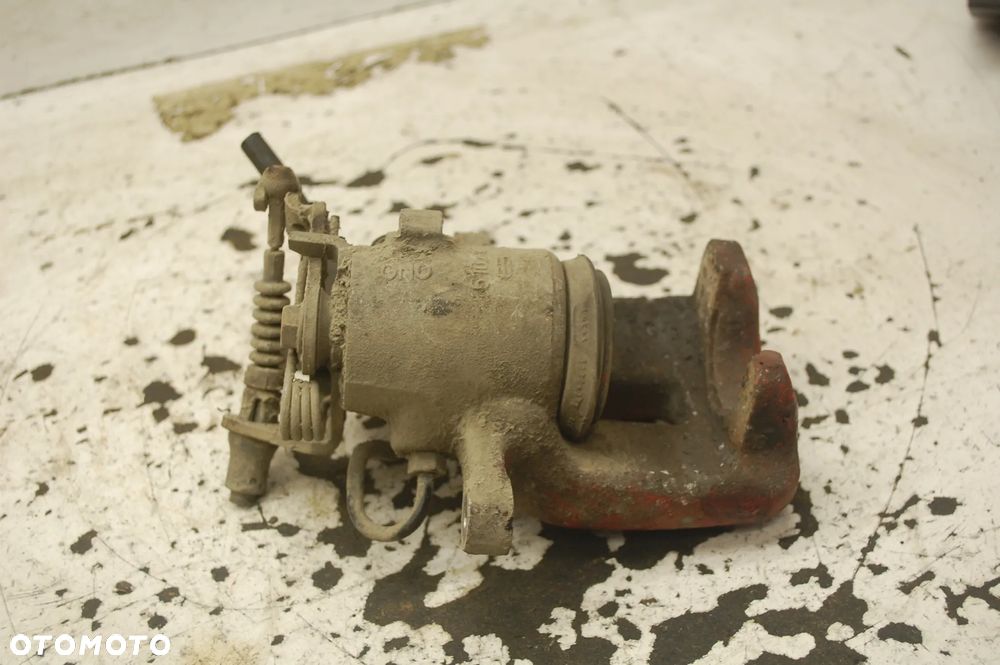 ZACISK HAMULCOWY PRAWY LUB LEWY TYŁ TYLNY SKODA SUPERB II 1.8 TSI SEAT ALTEA VW GOLF V AUDI TRW 518402 518221 - 2