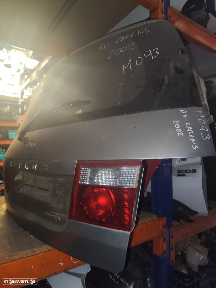 KIA CARENS 2002 - TAMPA DA MALA  M093 - 2