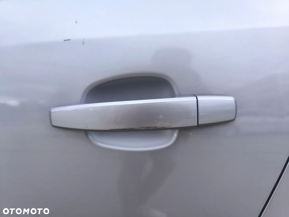 Opel Corsa 1.2 16V Enjoy - 23