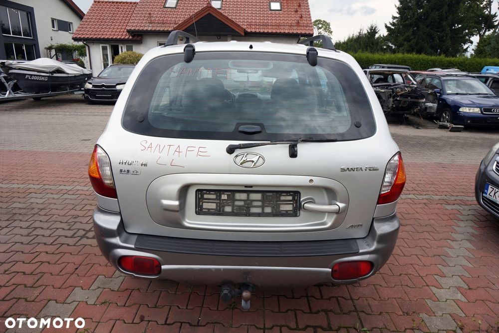 KLAPA BAGAŻNIKA TYLNA SANTA FE I SM LL  SREBRNY HYUNDAI 2000-2006 - 1