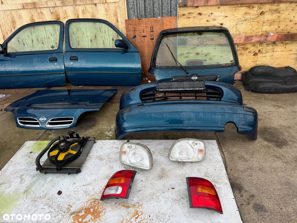 Nissan micra k11 drzwi przednie prawe lewe przód maska zderzak przedni lampy przód przednie tylne lampy tył chłodnica wentylator klapa bagażnik drzwi niebieski - 1