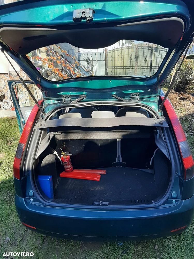 Ford Fiesta 1.4i Ghia - 10