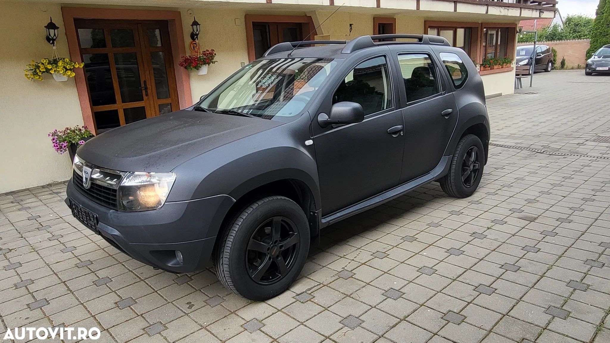 Dacia Duster 1.6 16V 4x4 Ambiance - 1